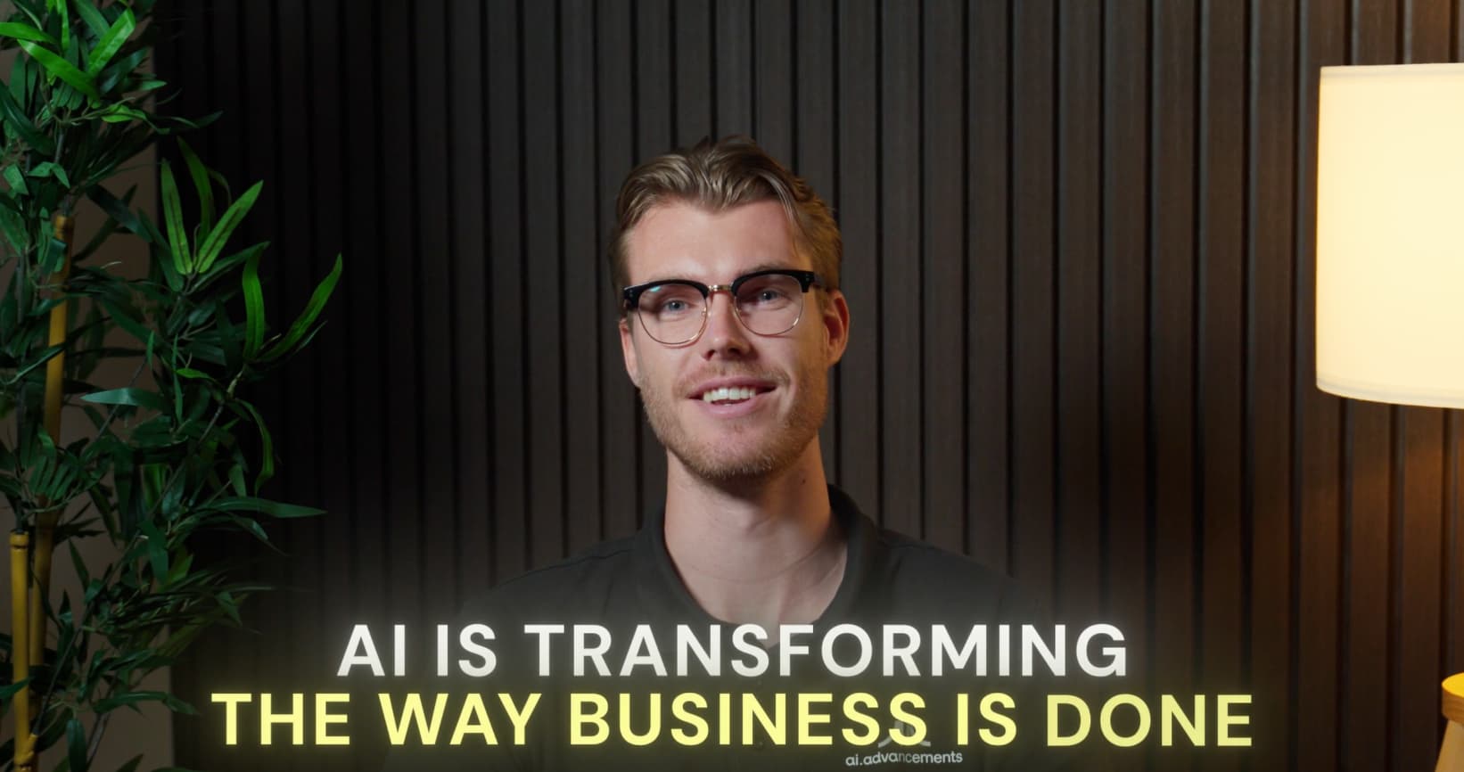 AI Advancements consultant smiling with text showing AI is transforming the way business is done